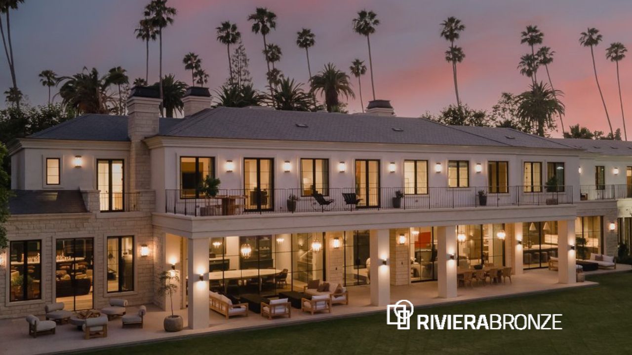 Why Architects Choose Steel Windows and Doors Exterior view of a luxury home at sunset featuring steel windows. The Intersection of Strength and Elegance: Why Architects Choose Steel Windows and Doors - Riviera Bronze