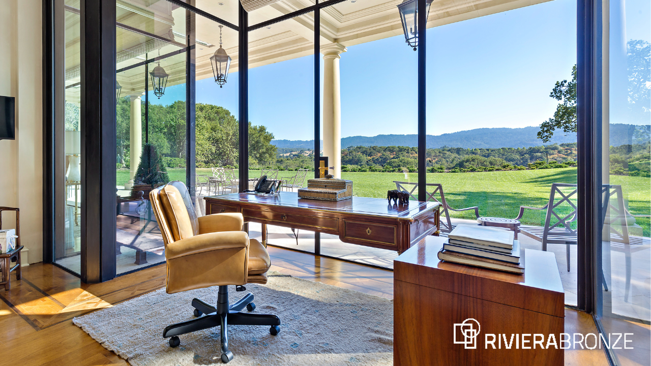 Thermally Broken Steel Windows in Luxury Home Office Luxury home office with custom Riviera Bronze thermally broken steel windows offering panoramic views and natural light.